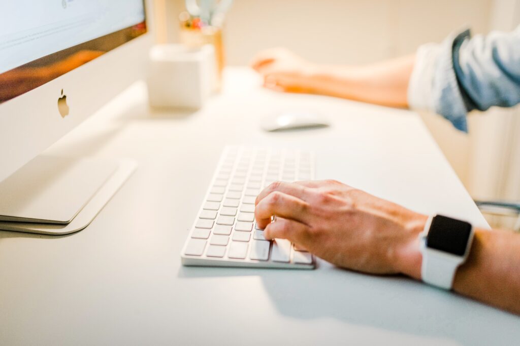 Image of person using a computer.