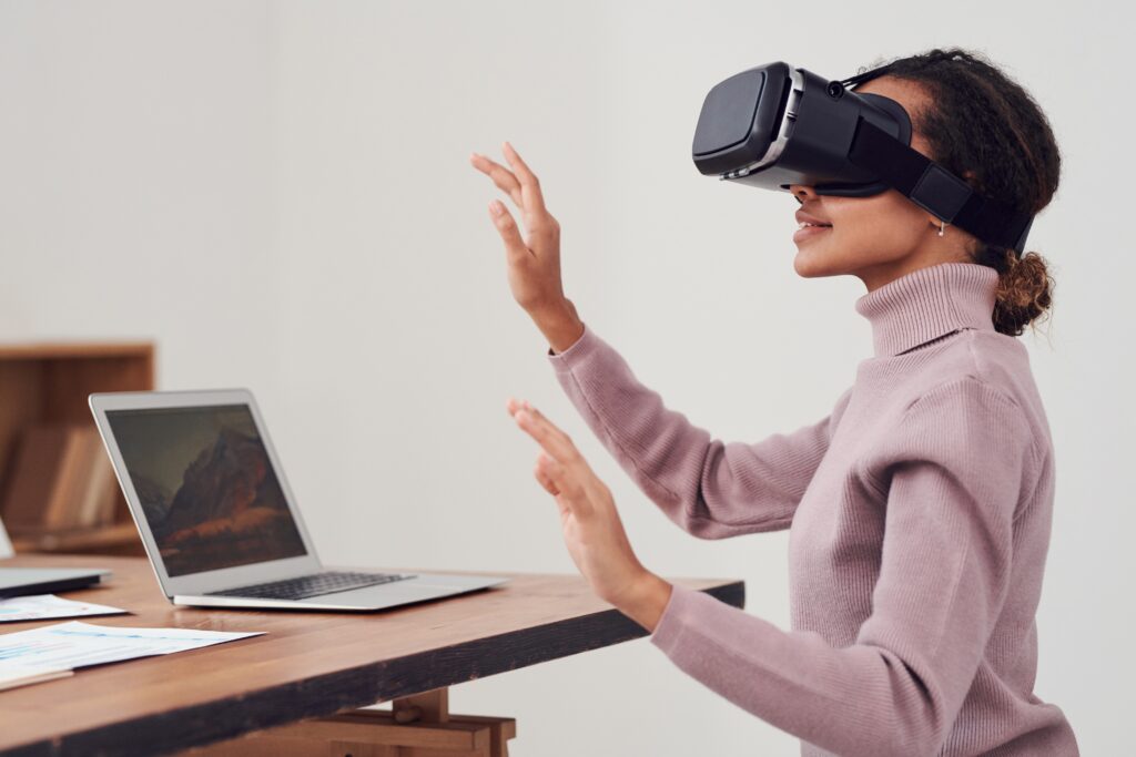Woman using virtual reality goggles.